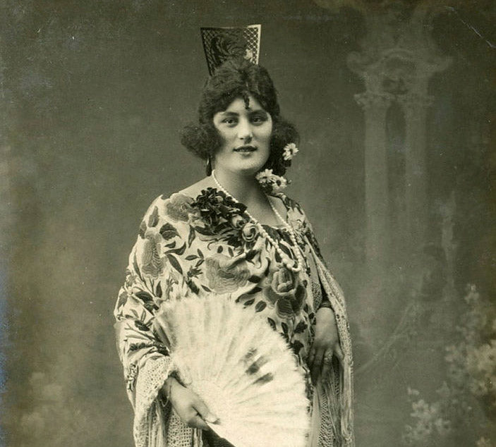 Between Spanish Comb, Lace veil, and Memory