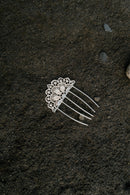 The Silver Spanish Comb